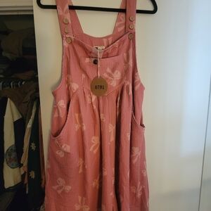 BiBi Pink romper with Bow Pattern